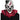 Black and white horror clown mask with attached hair – latex Halloween costume accessory - FunWorld - Party Shop