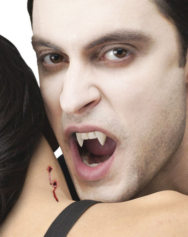 Realistic vampire fangs with dental putty – perfect costume accessory for Halloween or cosplay Funworld Party Shop